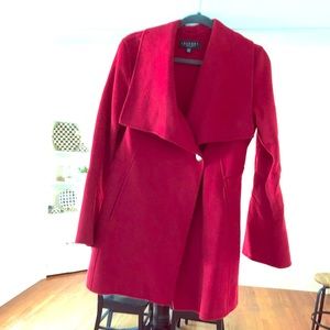 Beautiful flare sleeve red coat from Laundry.